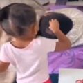 Mischievous little girl cuts off her father's hair and glues to her doll!