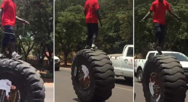 Cool stunt or death warrant? – Man rides tractor tyre on expressway, dares to skip on it
