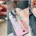 Nigerian man seen sewing togetherĀ  the one hundred naira note