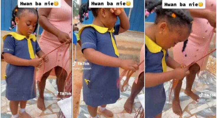 Young and daring Nigerian girl displays expertise in braiding hair 
