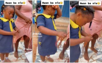 Young and daring Nigerian girl displays expertise in braiding hair 