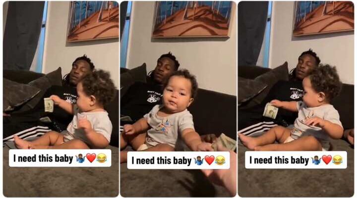 Smart baby girl pulls money out of dad’s pocket, hands it to mum