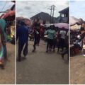 Video of extremely tall  woman spotted in Nigerian market stuns netizens