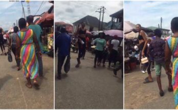 Video of extremely tall woman spotted in Nigerian market stuns netizens