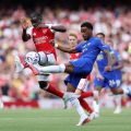 Arsenal players celebrate their 2-1 win over Chelsea in the Premier League