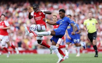 Arsenal players celebrate their 2-1 win over Chelsea in the Premier League